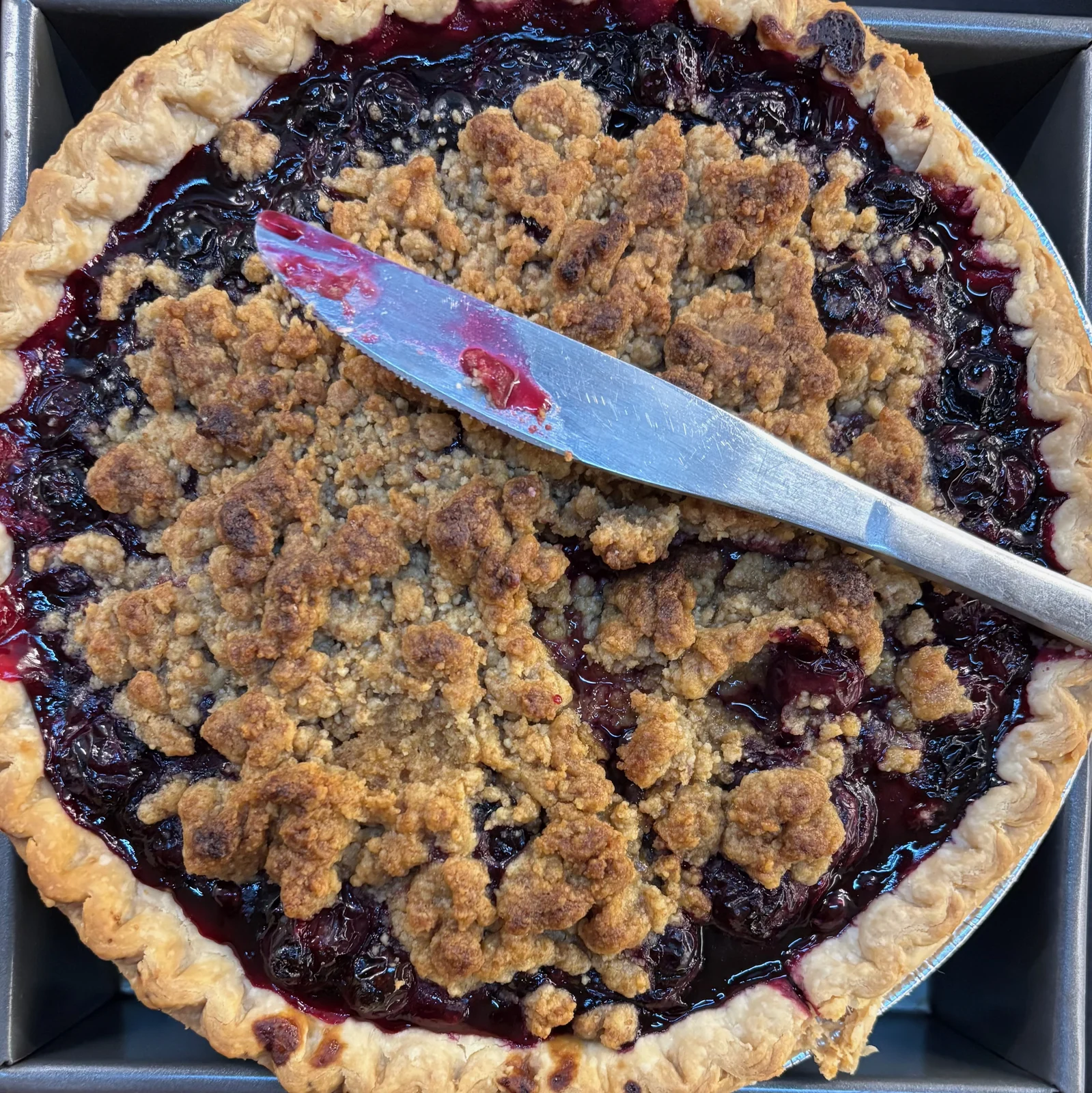 Same pie and silver knife arrangement as 012, differently cropped/framed.